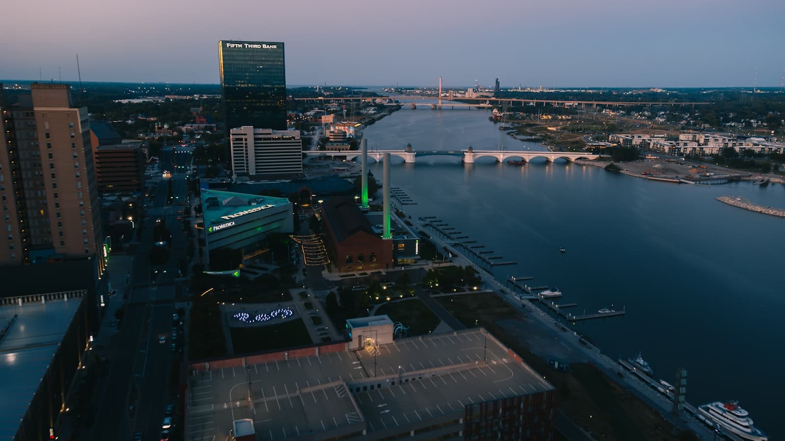Toledo — Cityscape with river and bridges at dusk