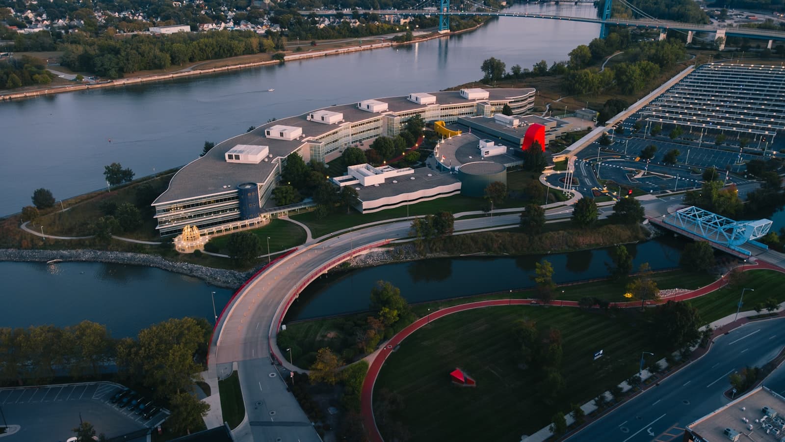 Toledo — Modern office buildings beside a river and bridge.
