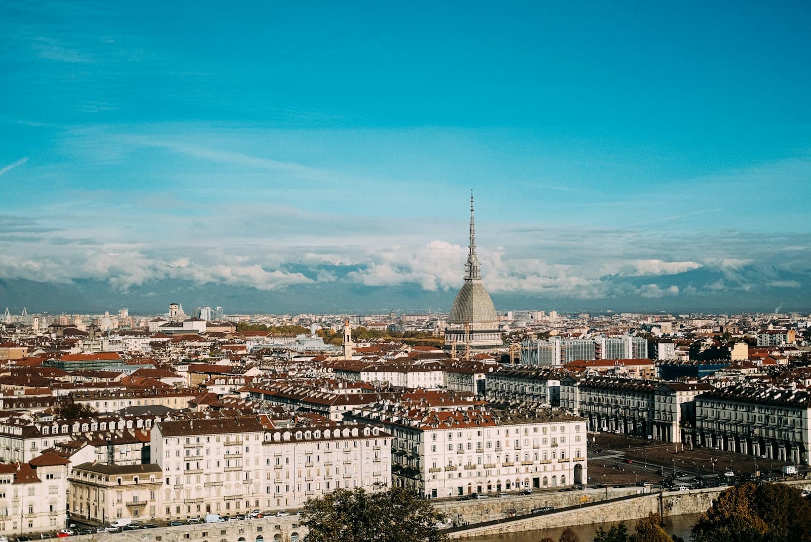 Torino — white and brown concrete building under blue sky during daytime