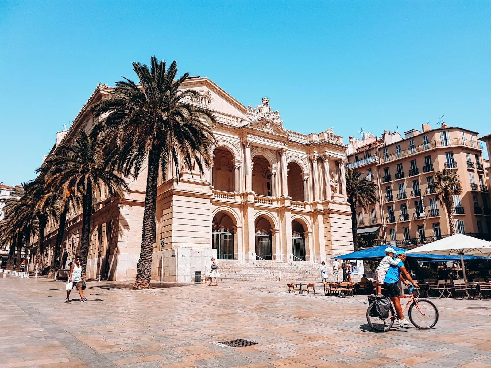 Toulon — people walking near white concrete building during daytime