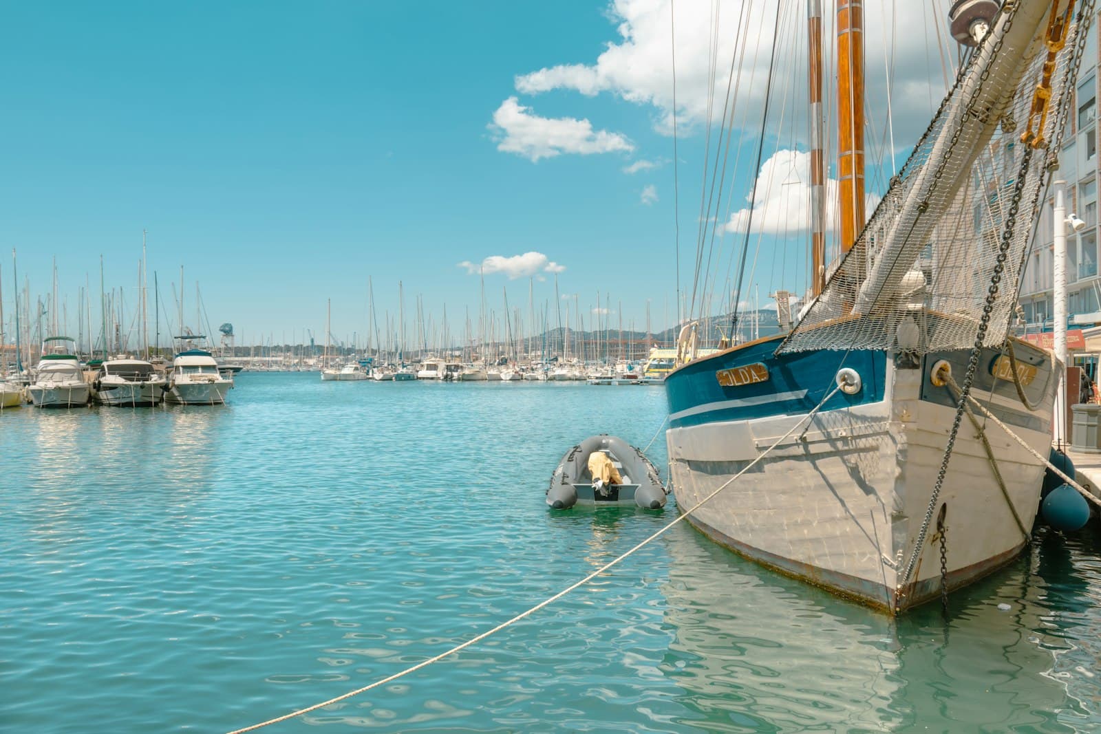 Toulon — a sailboat tied to a dock in a harbor
