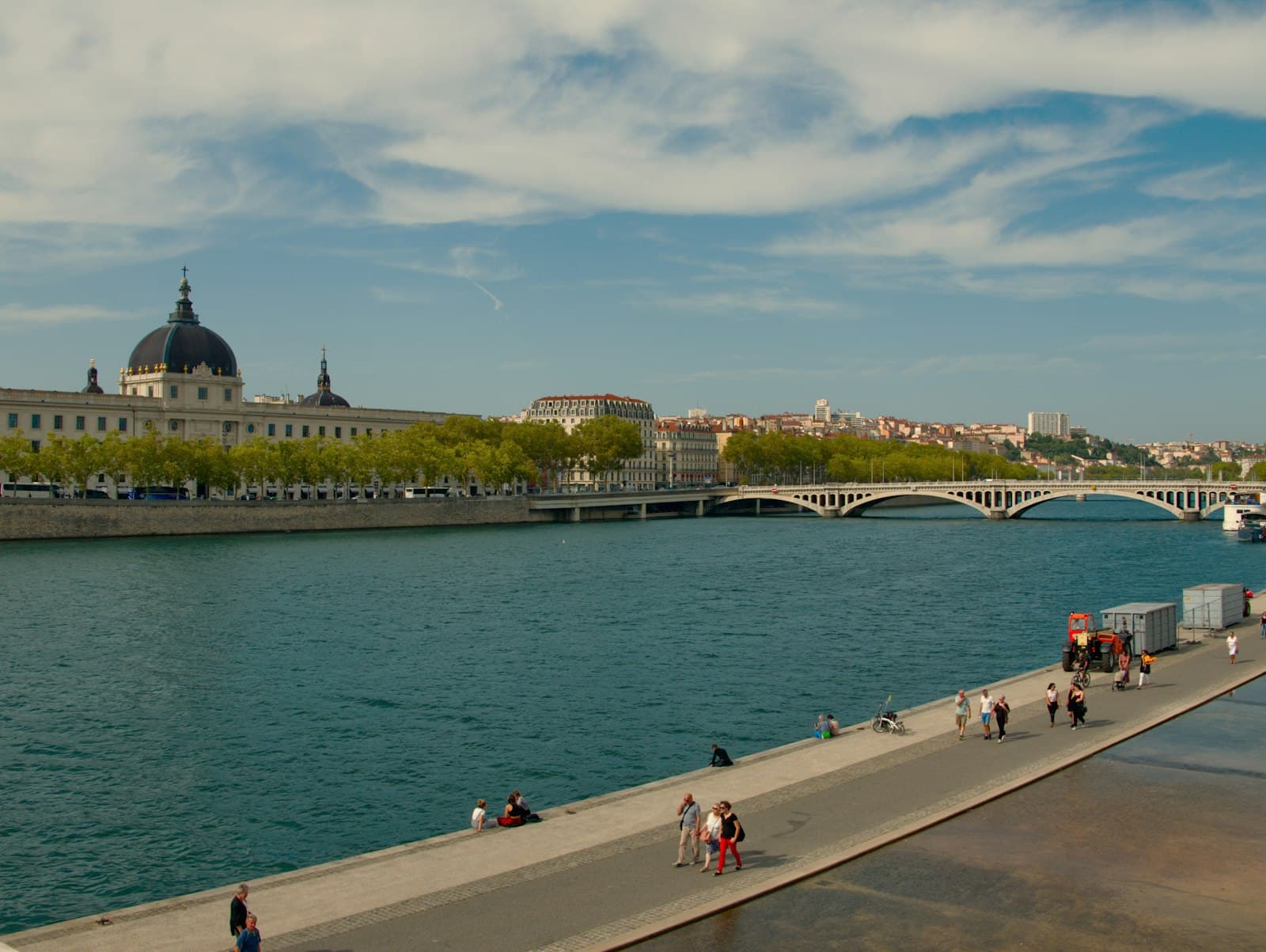 Tournon-sur-Rhône — people walking beside river