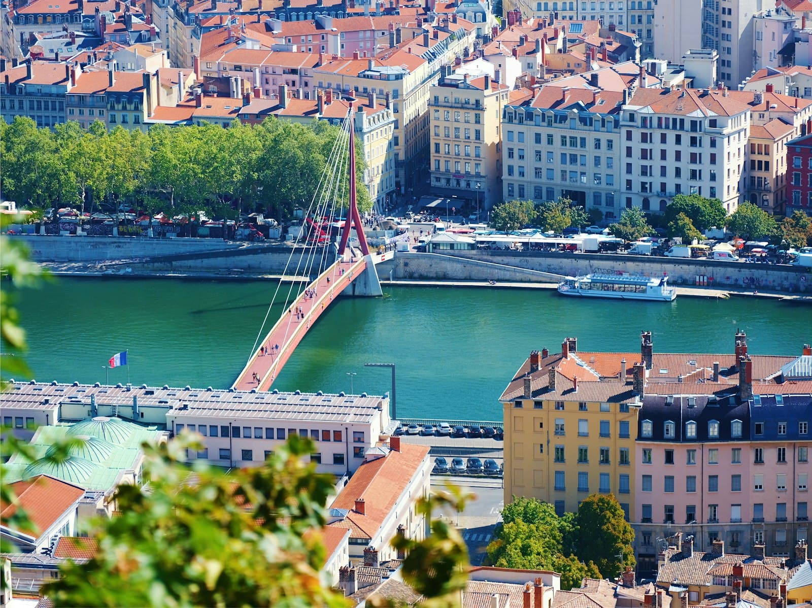 Tournon-sur-Rhône — a view of a bridge over a river in a city