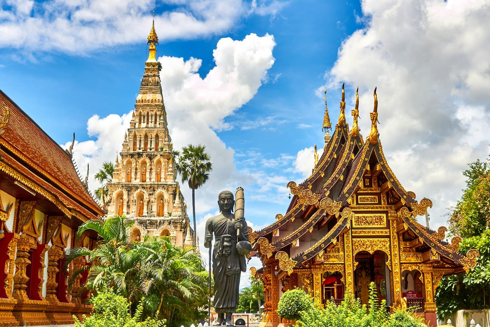 Trat — standing statue and temples landmark during daytime