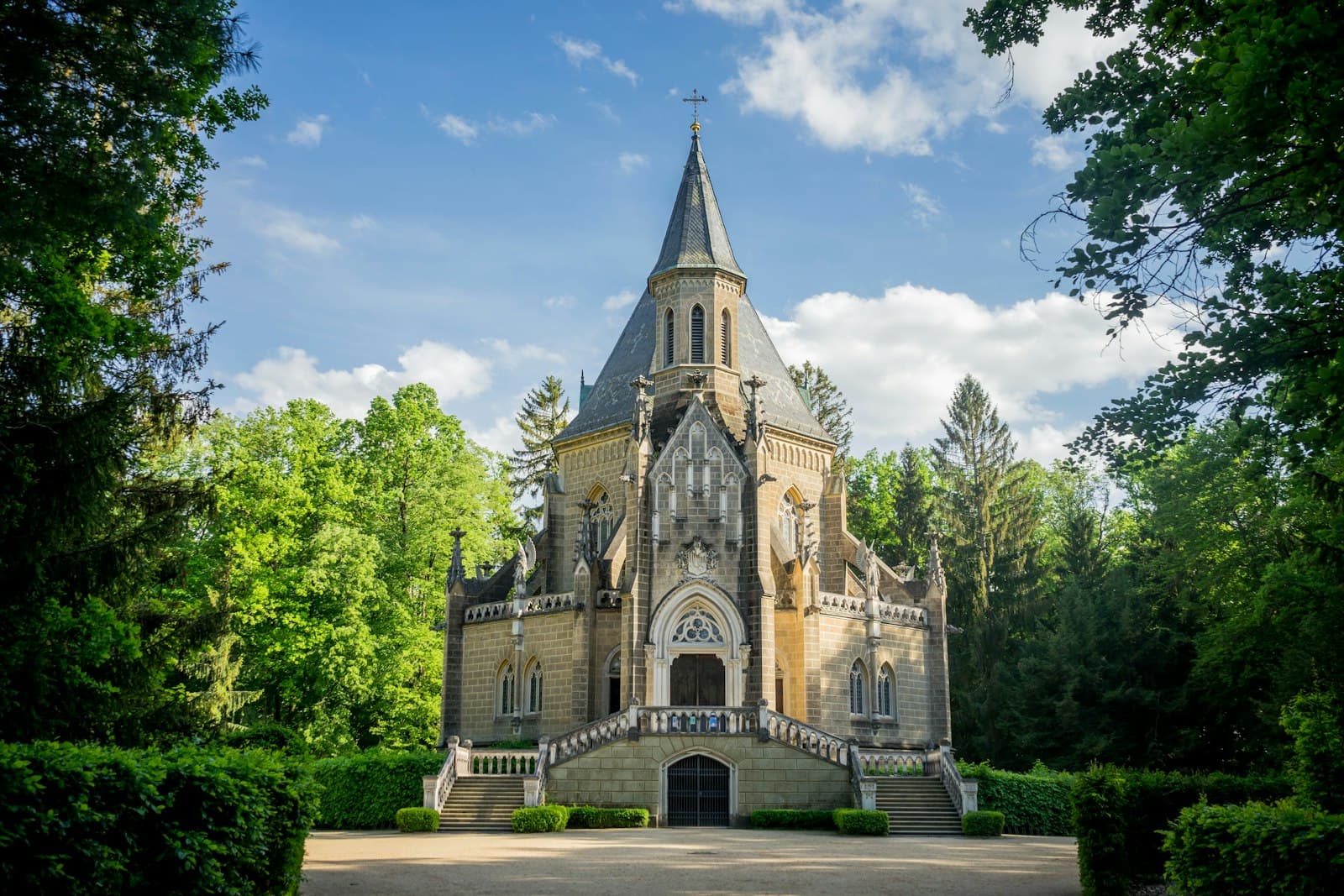 Třeboň — a large building with a steeple surrounded by trees