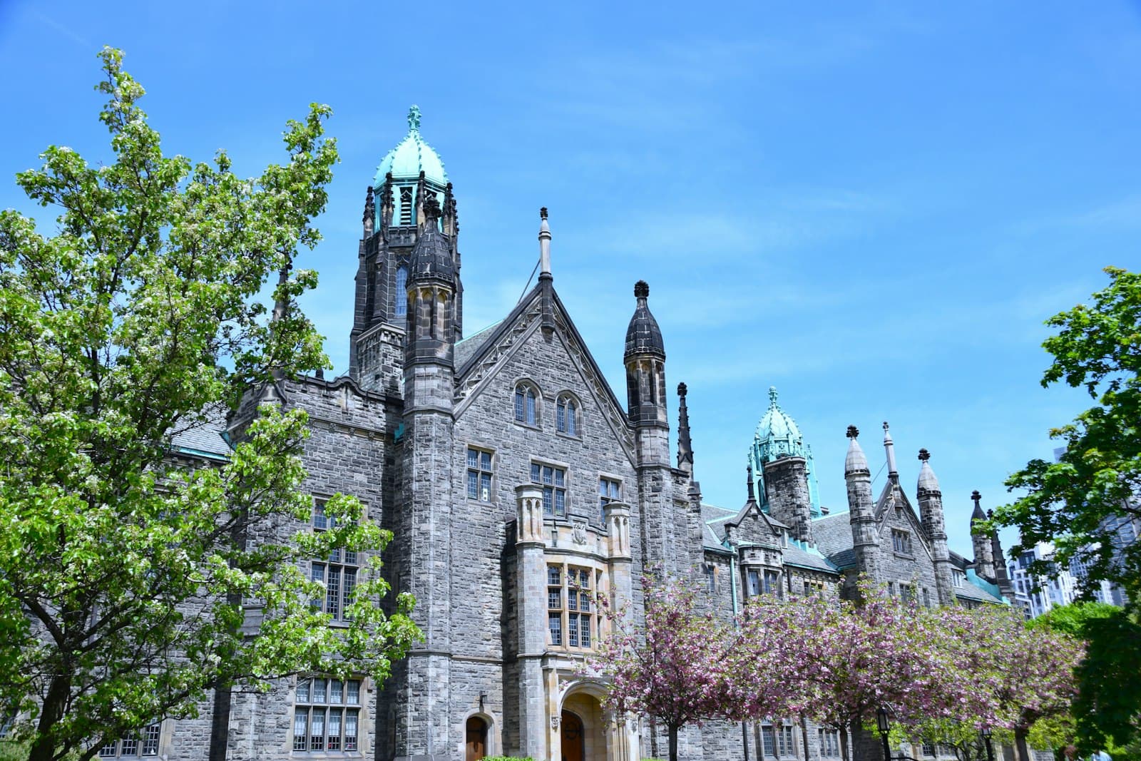 Trinity — a large stone building with a clock tower