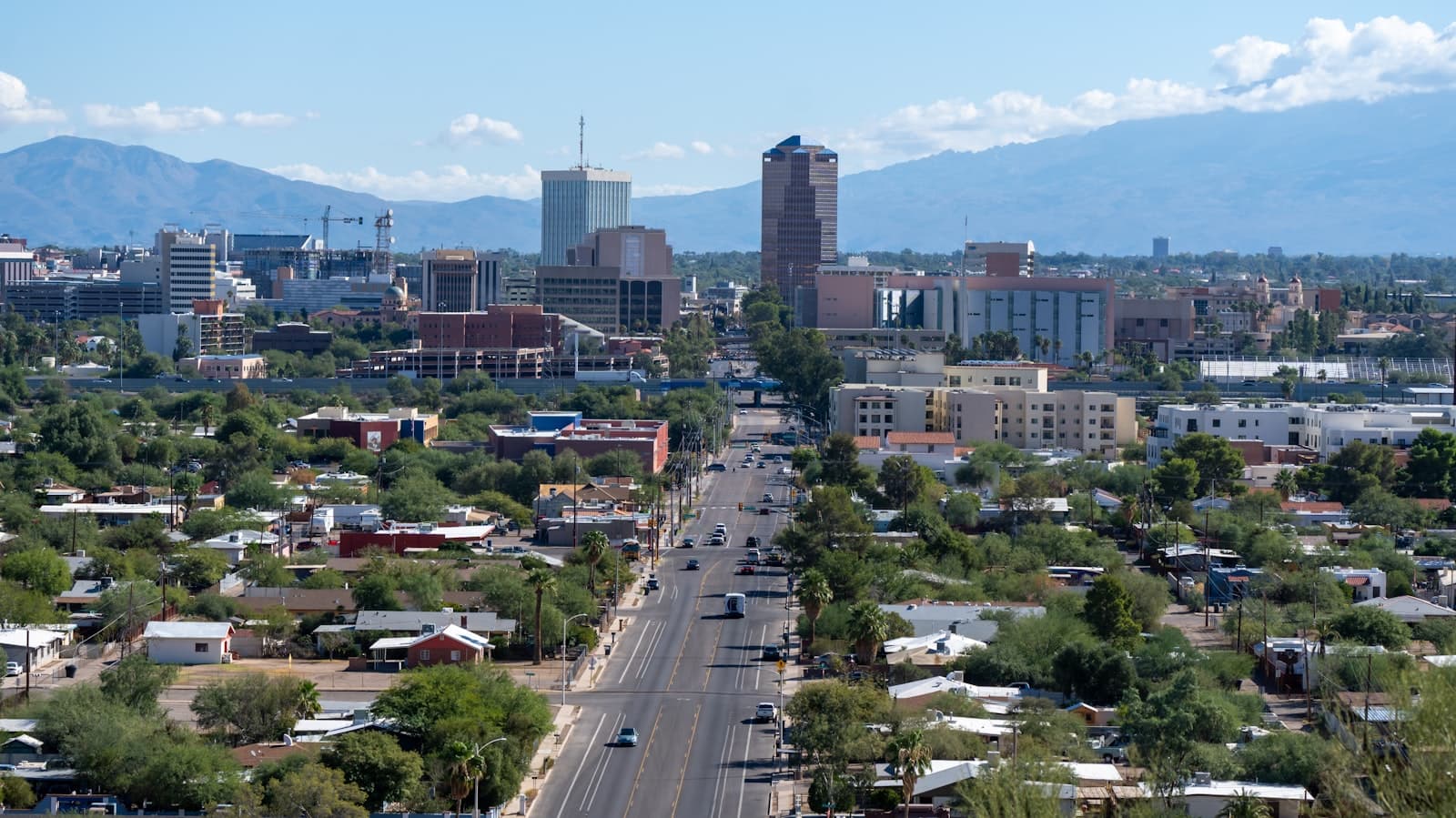 Tucson — a view of a city with mountains in the background