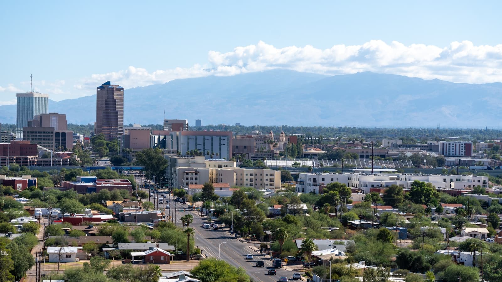Tucson — a view of a city with mountains in the background