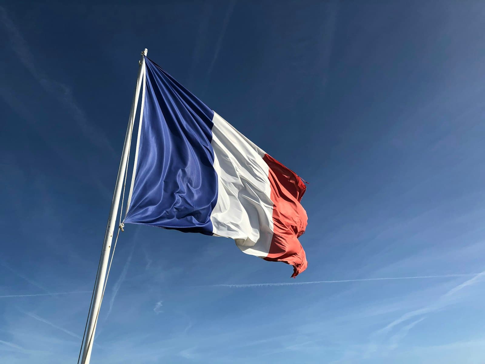 Tulle — Yugoslavia flag under blue sky