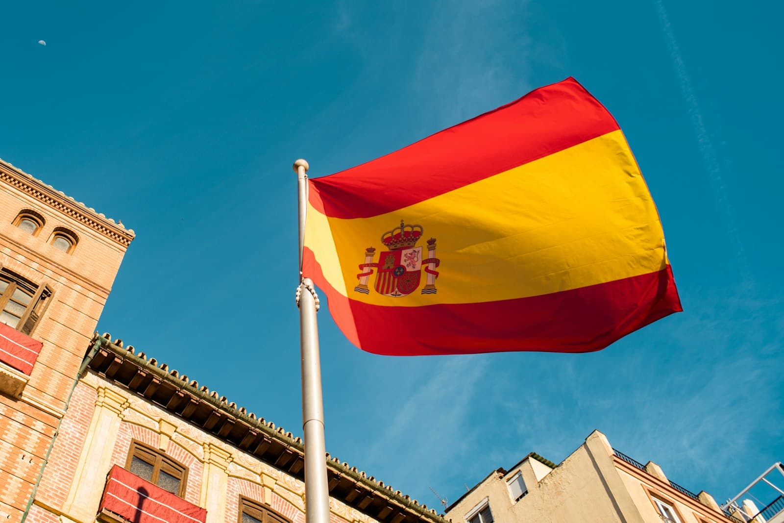 Ujué — a spanish flag flying in front of a building