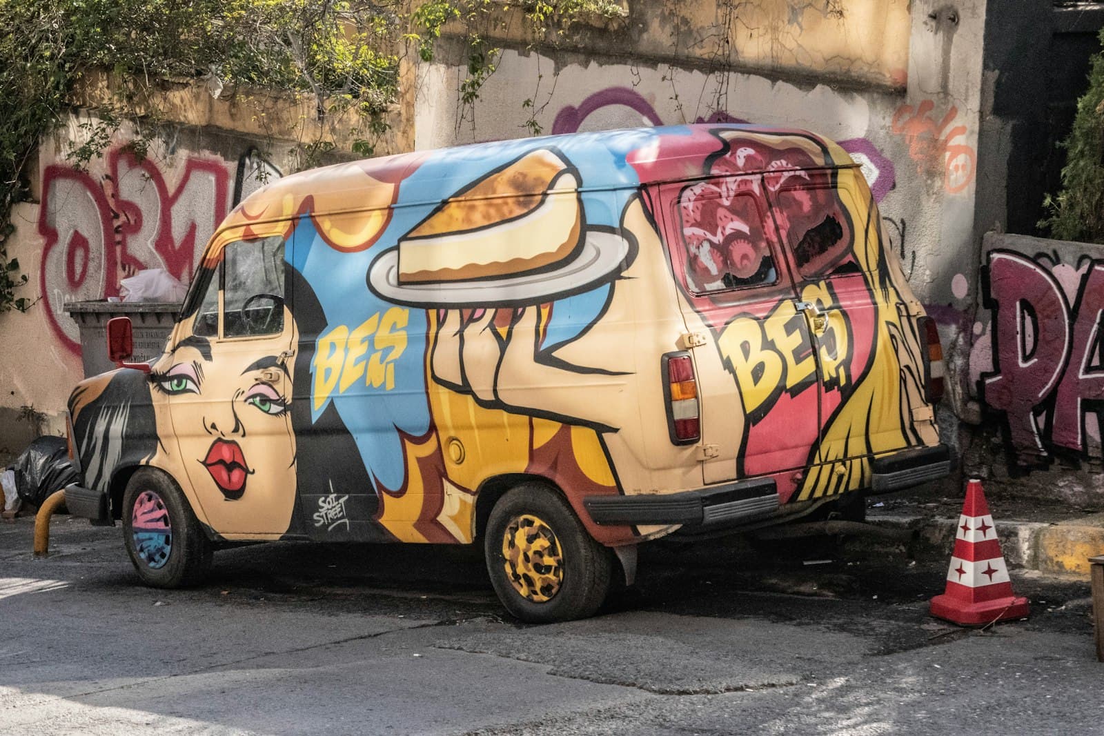 Van — a van with a painting on the side of it