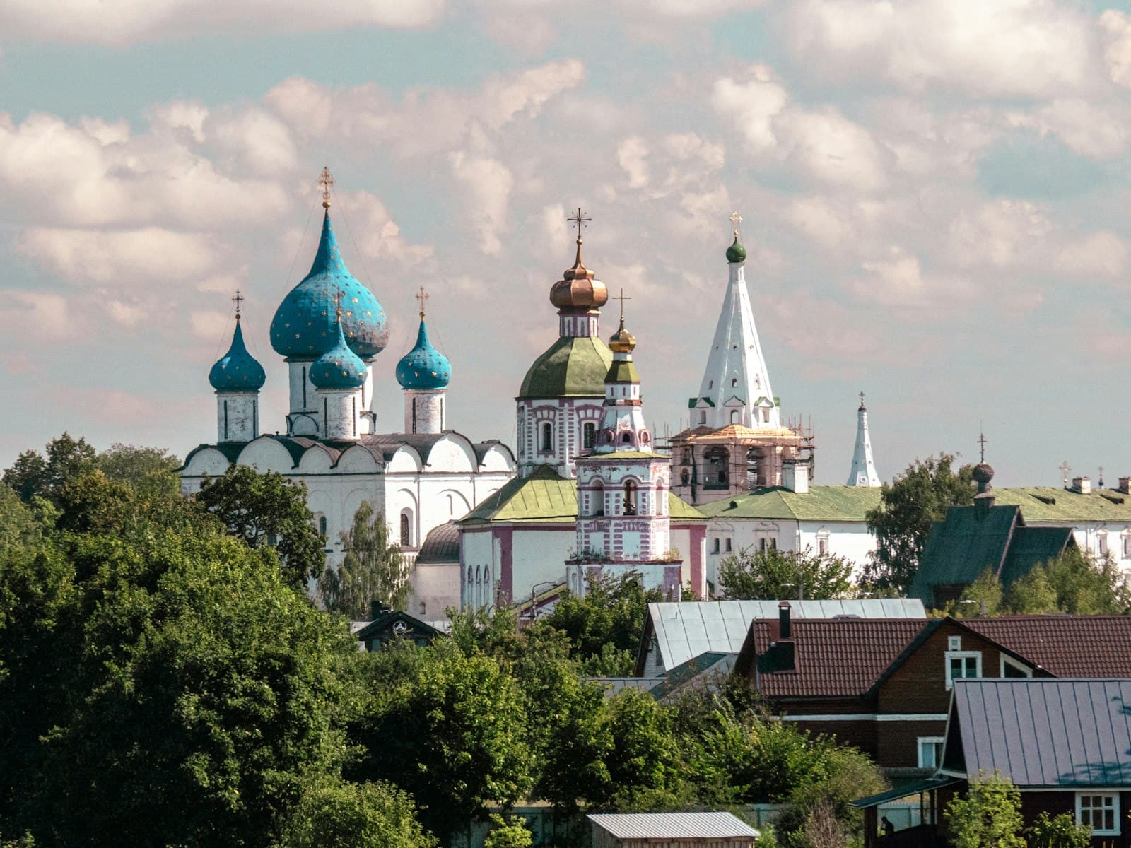 Veliky Ustyug — a view of a city with a lot of tall buildings