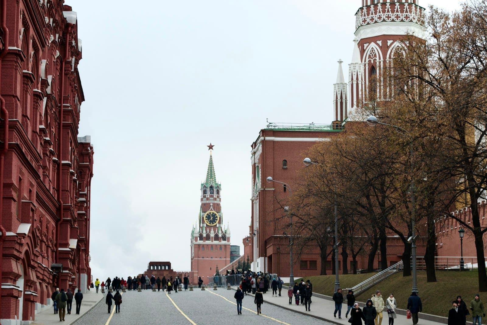 Veliky Ustyug — a large clock tower stands over a busy street