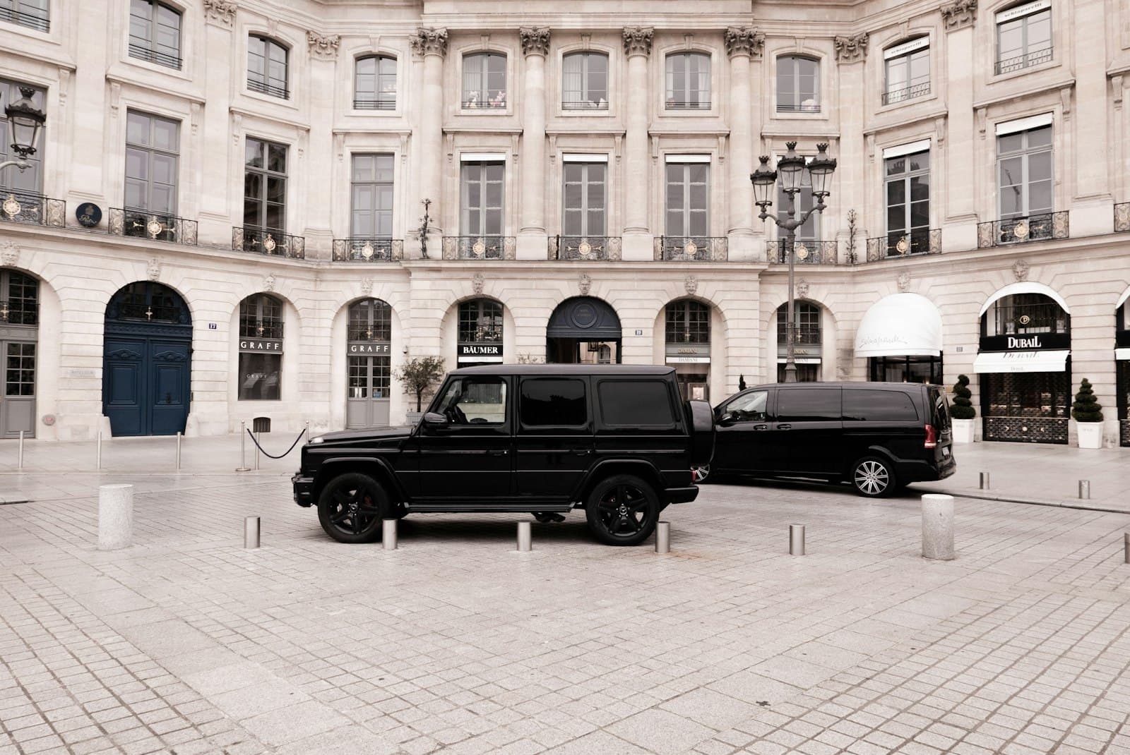 Vendôme — a black truck parked in front of a large building
