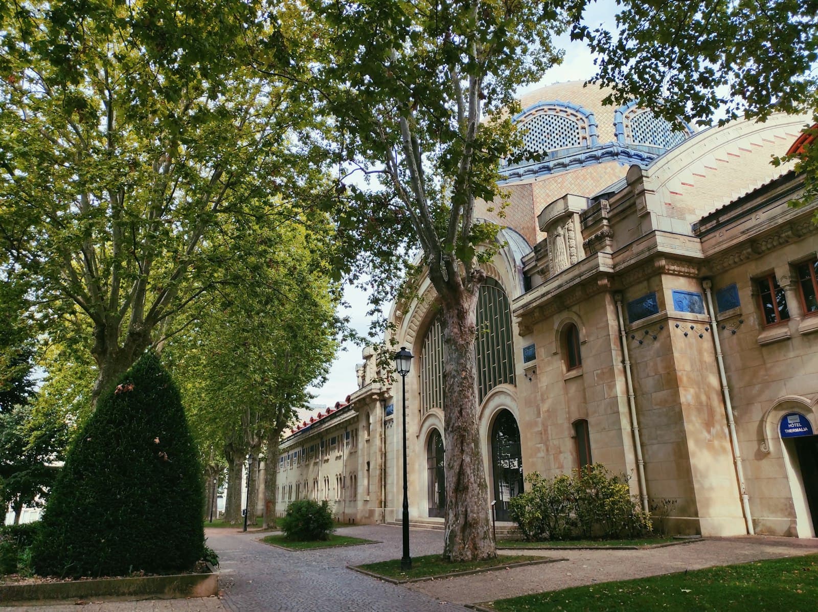 Vichy — a building with trees in front of it