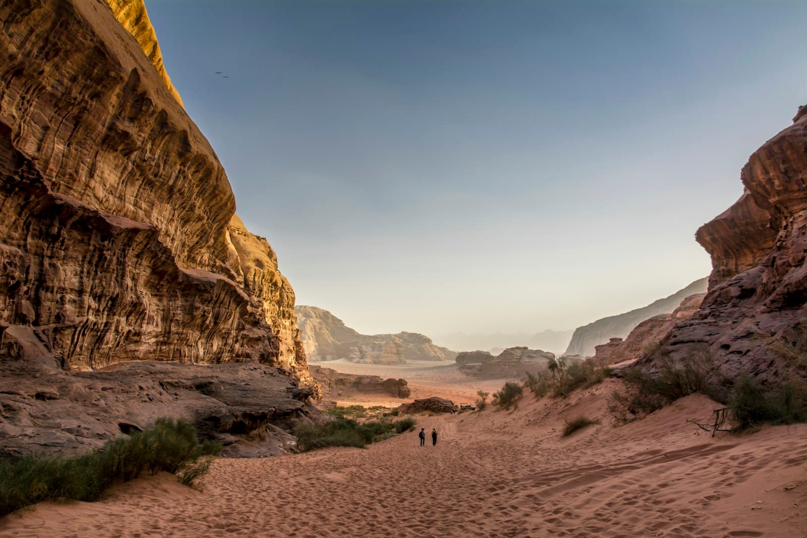 Wadi Rum — brown rocky mountain under blue sky during daytime