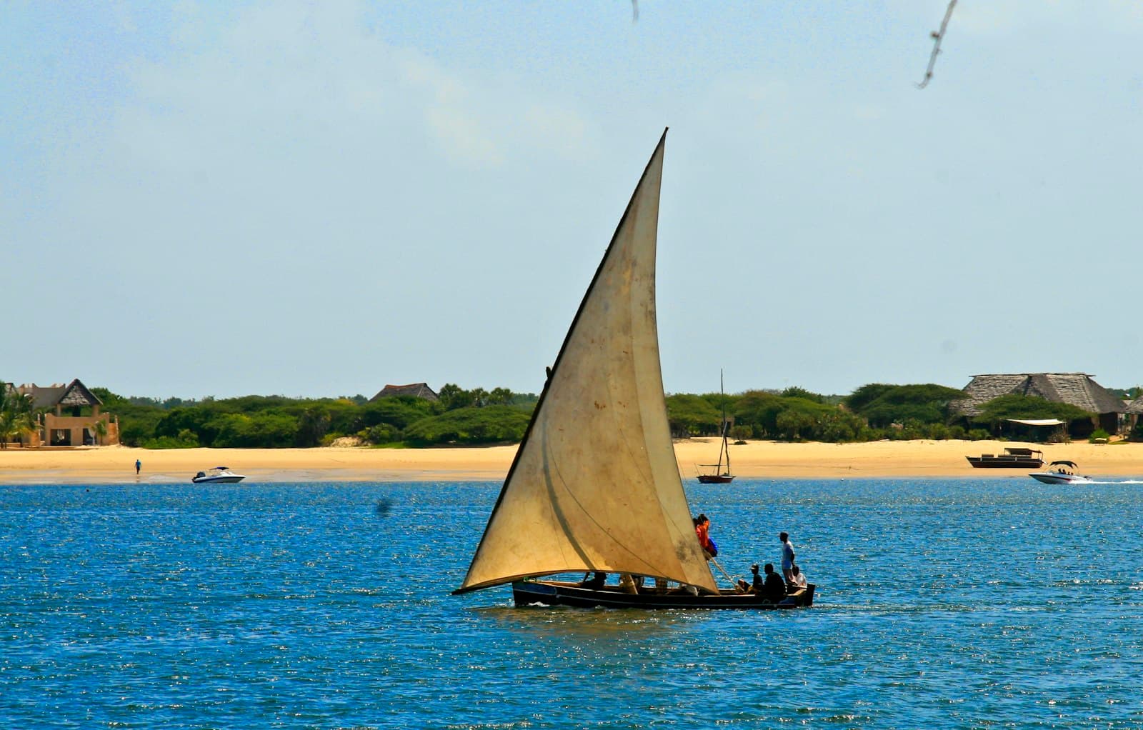 Watamu — a sailboat with two people on it in the water