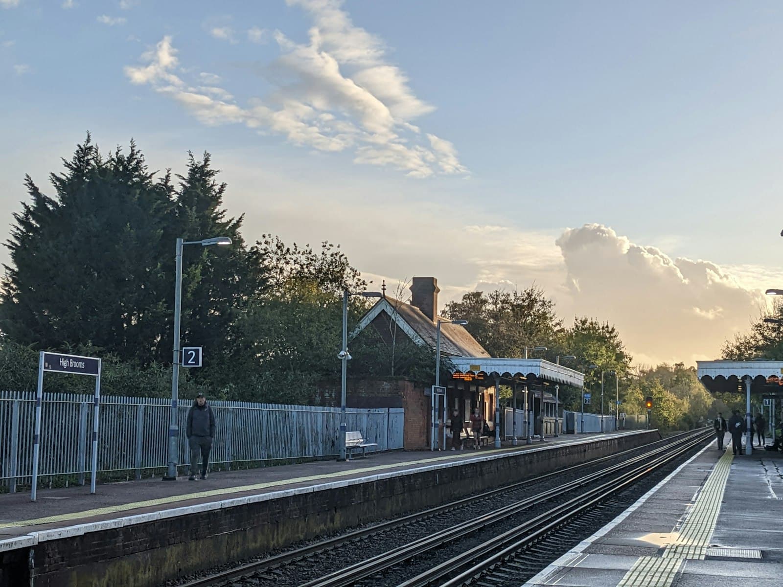 Wells — a train station with people