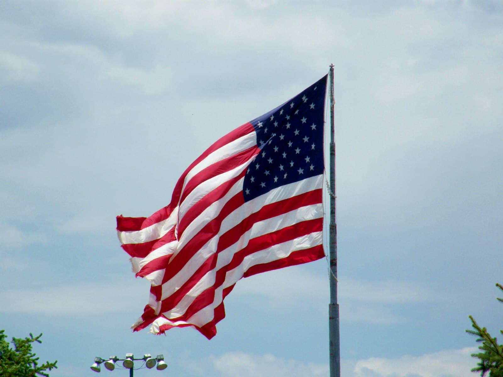 Williams — a large american flag flying in the wind