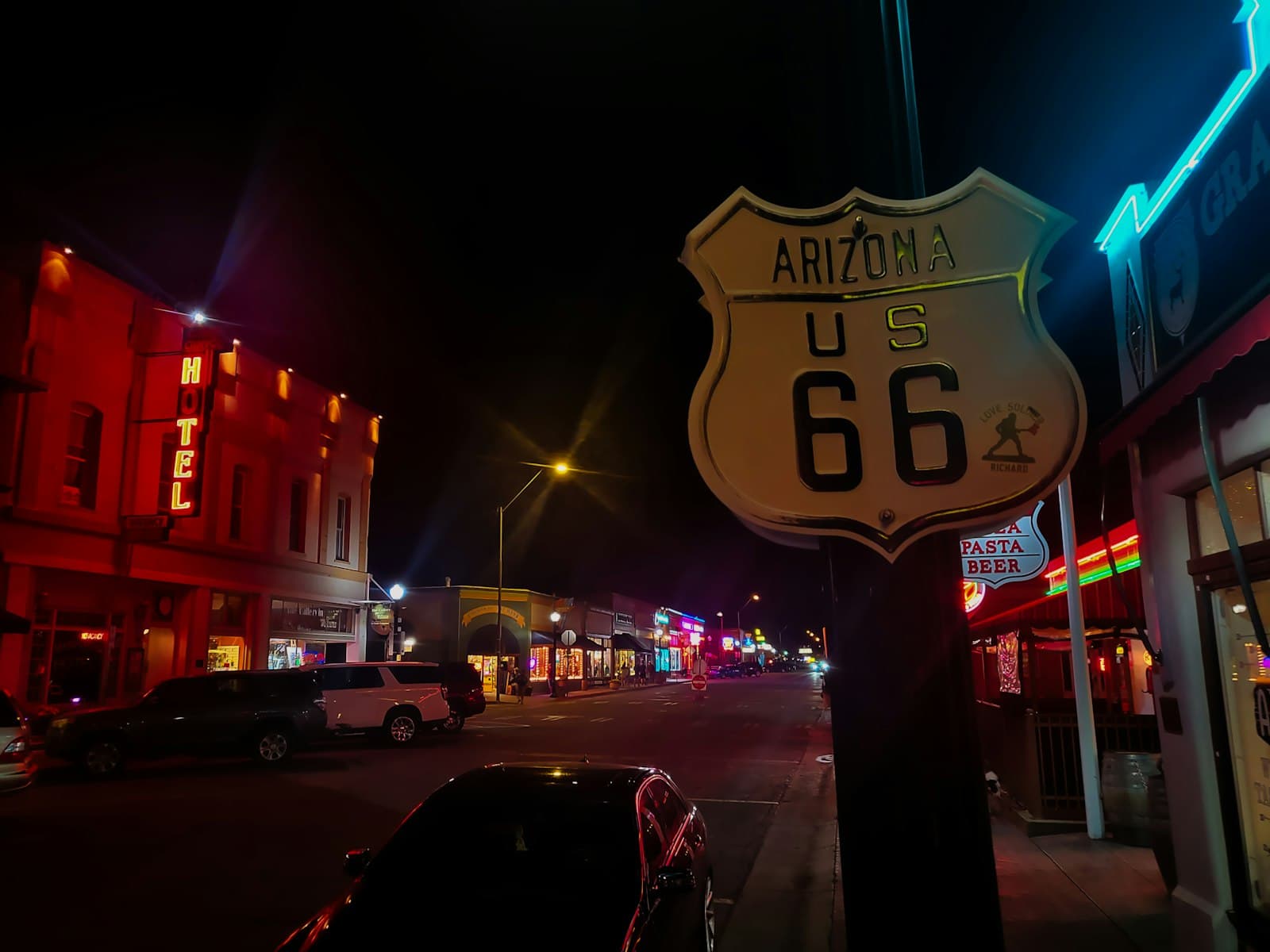 Williams — a street sign on the side of a road at night