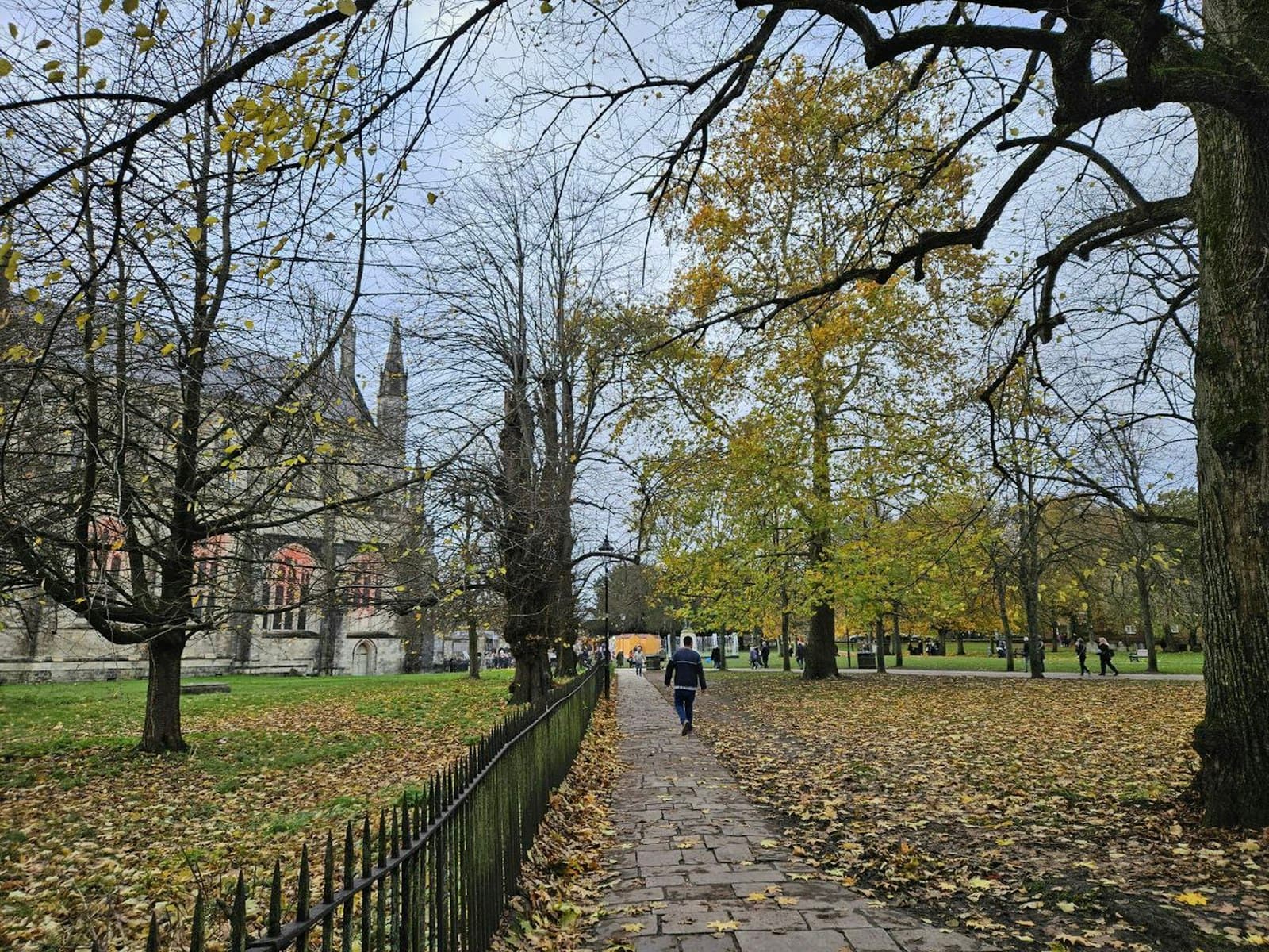 Winchester — two people walking down a path in a park