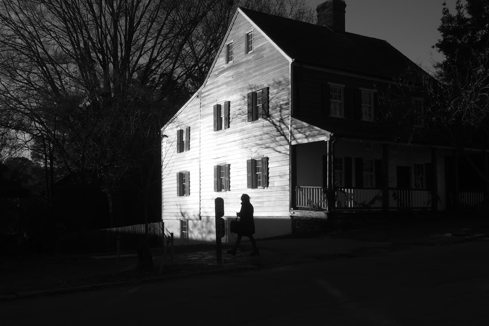 Winston-Salem — 2 person standing in front of white and brown house