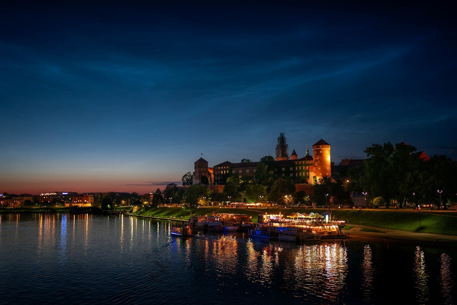 Wodzisław Śląski — A lake with boats in it and a city in the background