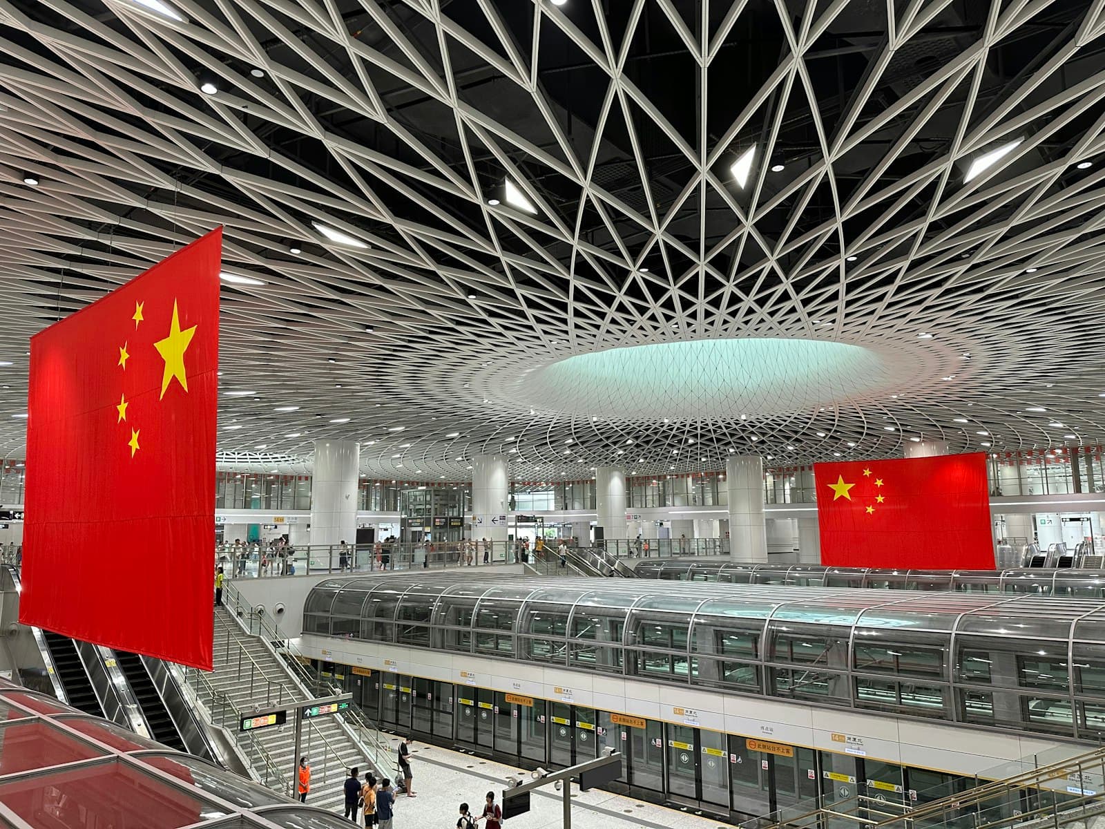 Xiapu — a train station with a train and a flag hanging from the ceiling