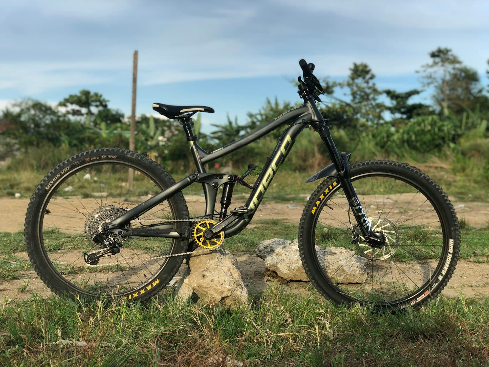 Zamboanga — black and yellow mountain bike on brown rock during daytime