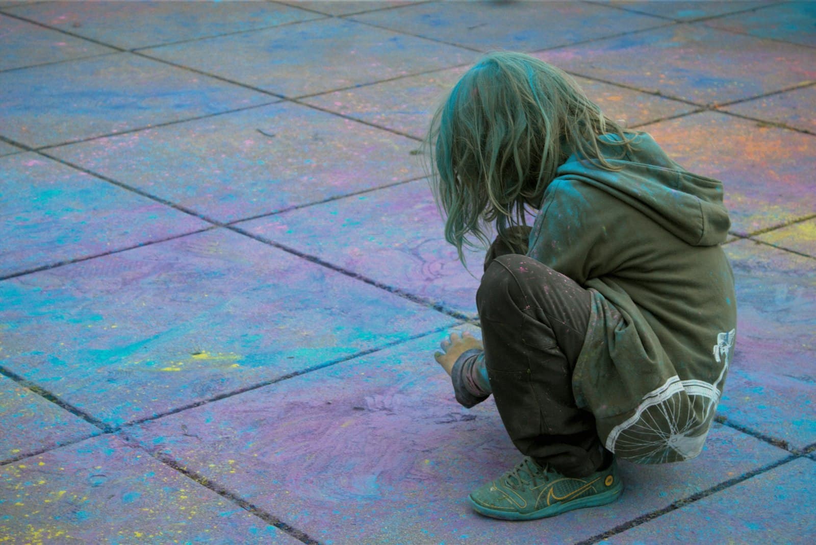 Zeitz — A person is covered in colorful powder